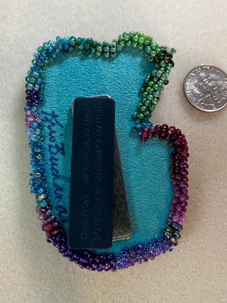 Purple, turquoise and green pin