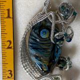 A wire wrapped Lisa bead pendant