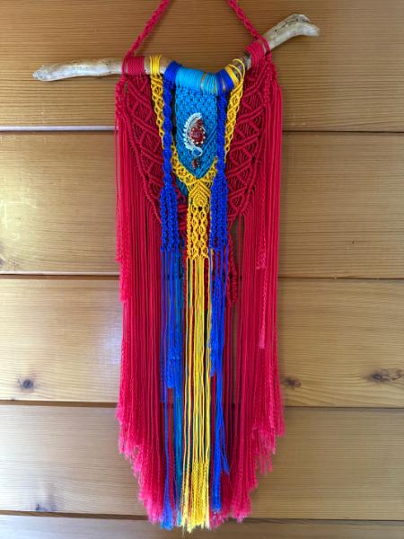 Red/yellow/turquoise Macrame with a hand made wire wrapped glass bead