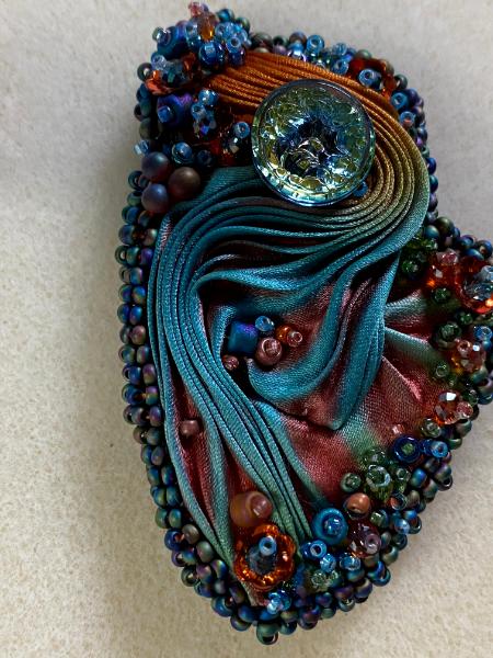 Turquoise and rust pin