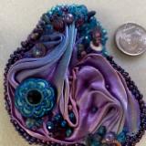 Purple and turquoise pin