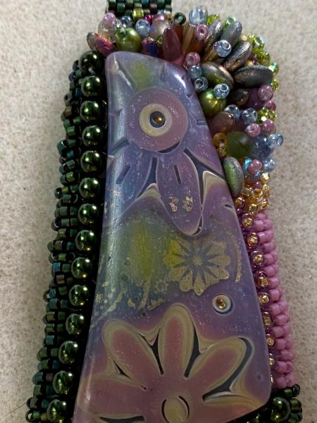 Purple with flowers Polymer pendant